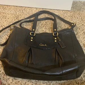Black leather Coach crossbody with gold hardware
